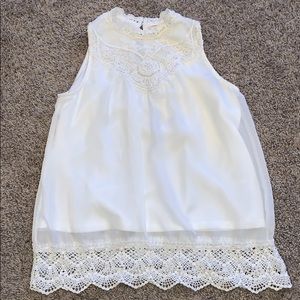 Girls beautiful white sleeveless blouse